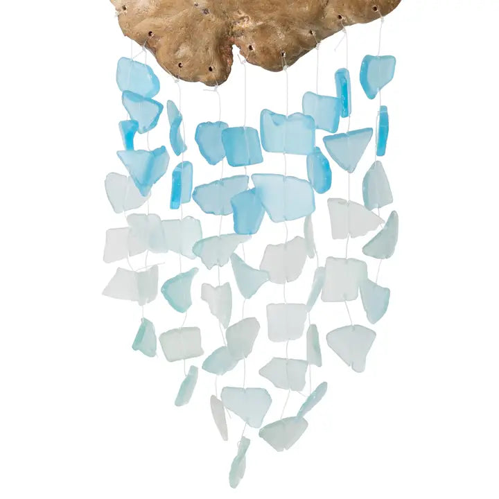 Decorative wind chime with blue and white glass pieces hanging from a natural wood base on a white background.