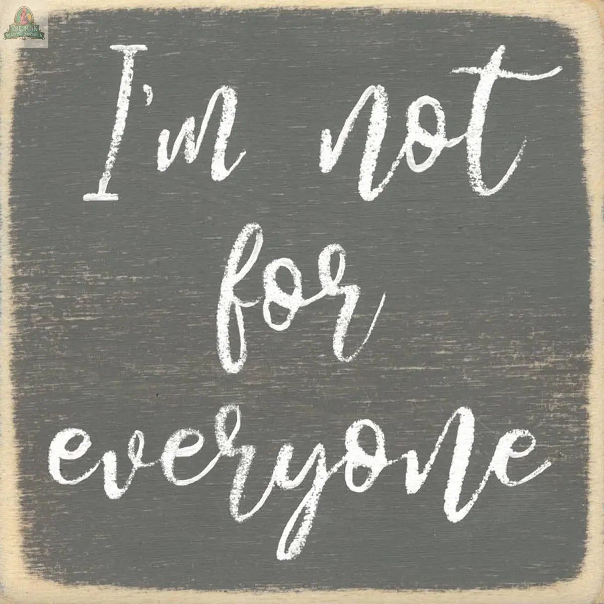Add personality to your decor with the 4X4-I'm Not for Everyone sign by Pink Platypus Emporium—a chalkboard-style piece featuring handwritten white text on a gray background with a vintage border. Perfect for your block sign collection!.