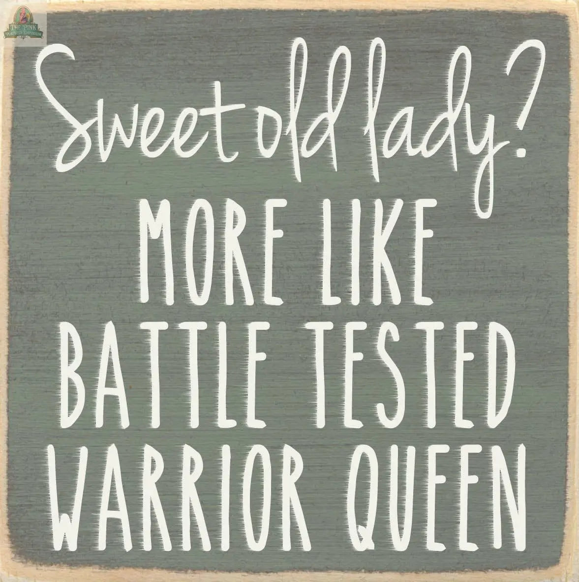 The Pink Platypus Emporium 4X4-Sweet Old Lady block sign features "Sweet old lady? More like battle tested warrior queen" in white text on a gray, chalkboard-style background.