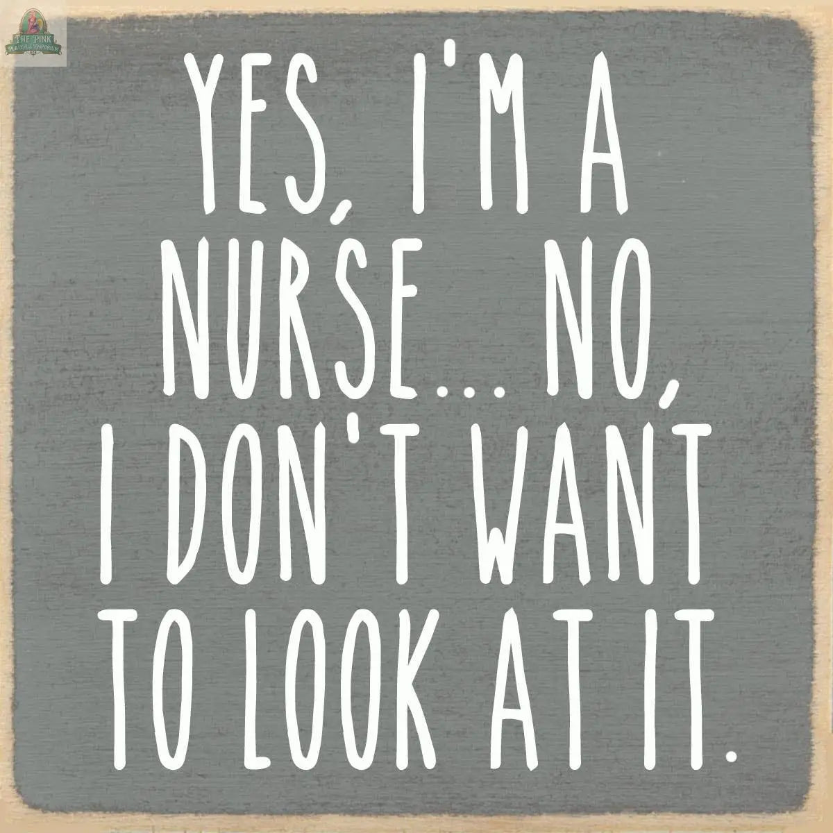 The Pink Platypus Emporium 4x4-I'm a nurse block sign features white text on gray wood with charming beige edges, making it a playful decor piece for any nurse.