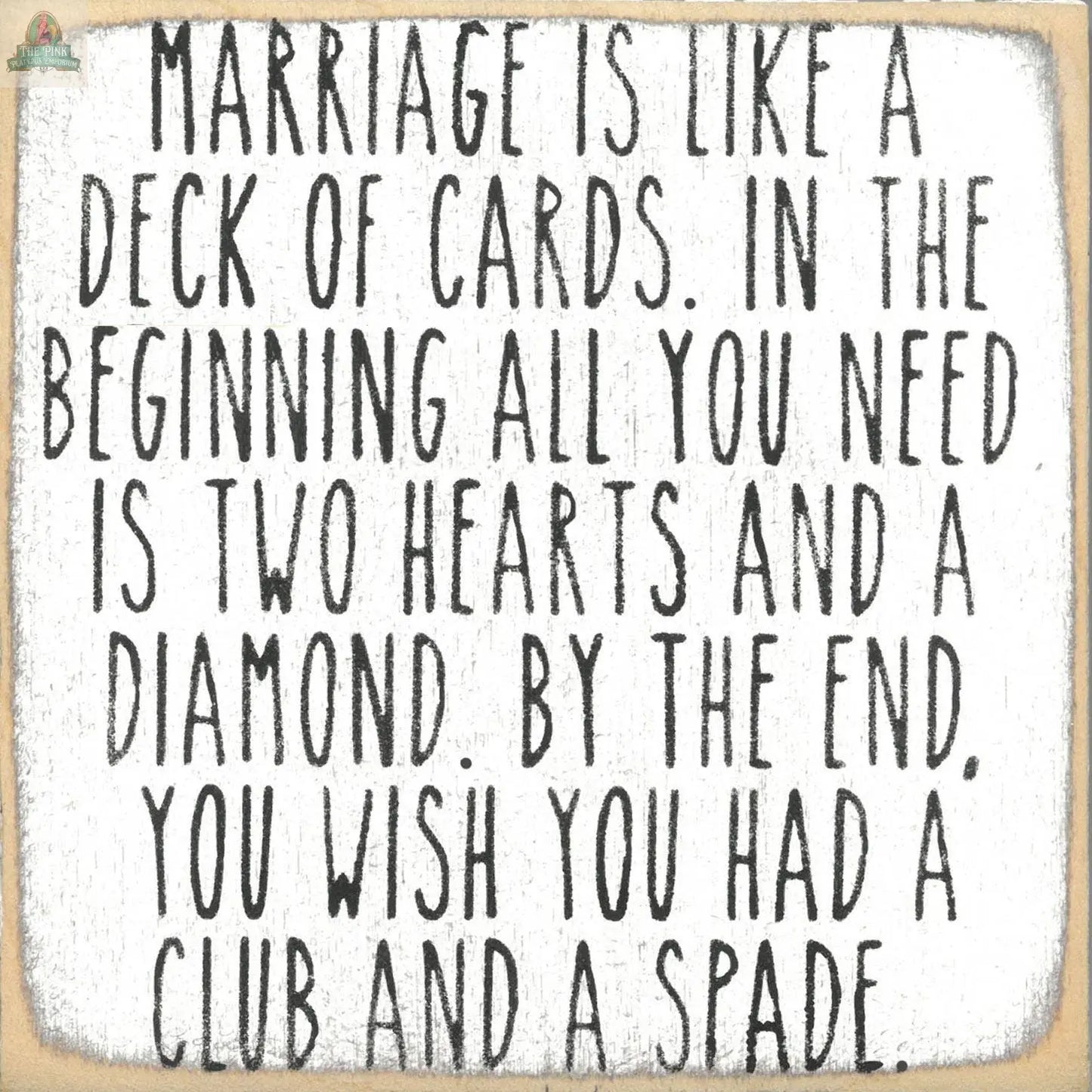 The "Marriage is like a Deck of Cards" sign by Pink Platypus Emporium features black handwritten-style text with a witty marriage quote—perfect as a humorous gift or home decor accent.