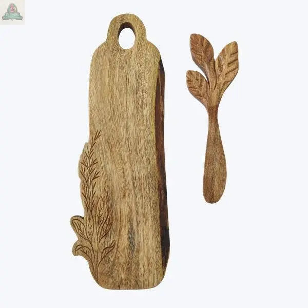 Young's Acacia Wood Charcuterie Board with Spreader Lodge/Woodland, featuring carved leaf designs and a handle with a hole, is displayed on a light background alongside its elegant, leaf-shaped spreading knife.