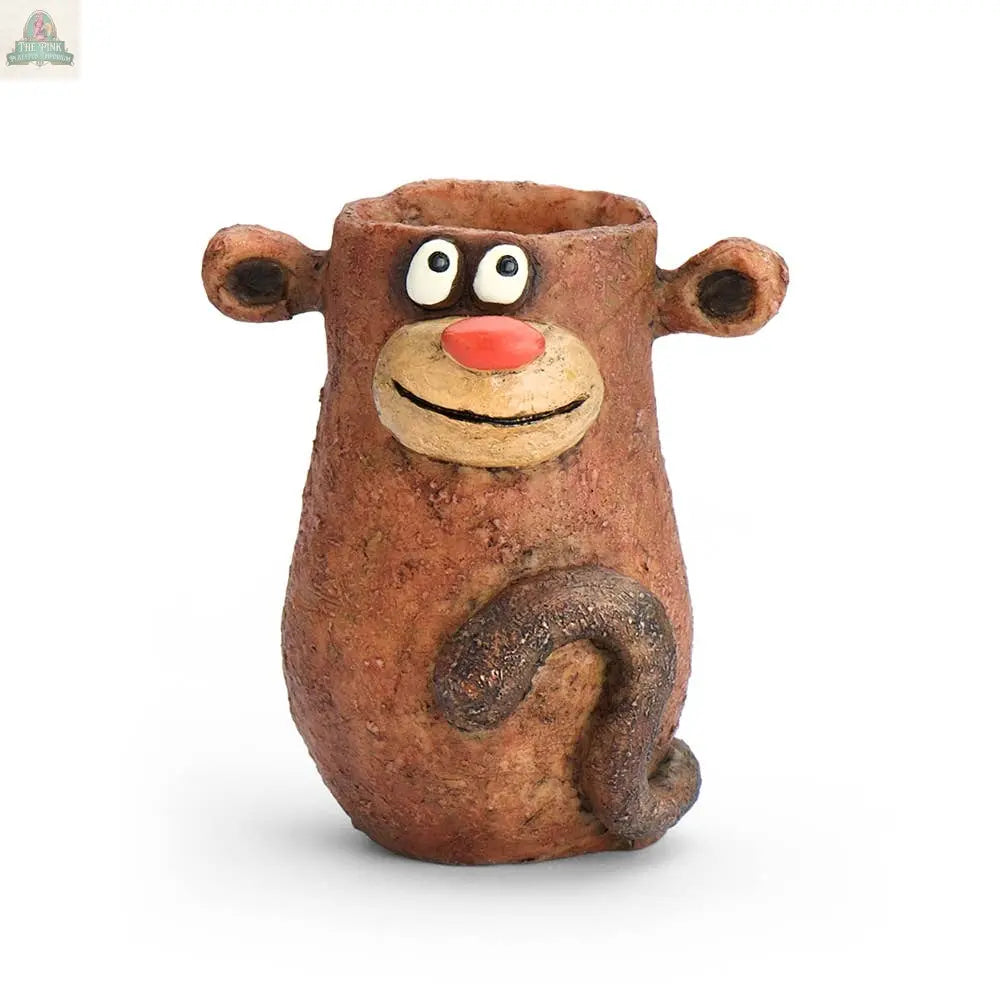 The Blob House Planters Baby Monkey, Peeper, Mini Blobhouse Planter is a cute brown ceramic monkey with big eyes, round ears, a red nose, and curly tail—ideal for succulents—pictured on a plain white background.