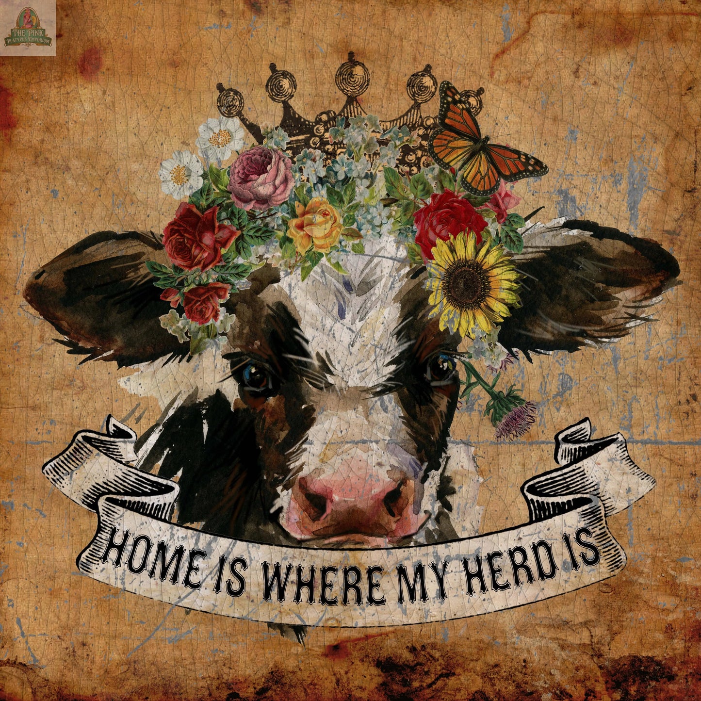 A cow with a colorful flower crown and butterfly is shown on a rustic background. Below, a banner says "Home is where my herd is"—a charming design for the Large 12" Glass Cutting Board/Charcuterie/Trivet.