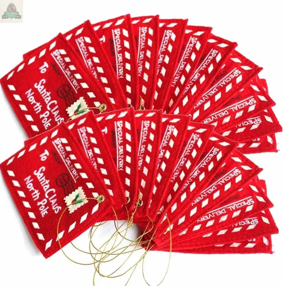 The Pink Platypus Emporium Letters to Santa Ornament is a red felt envelope ornament that opens, perfect as a festive Letters to Santa ornament or a charming gift card holder, complete with gold hanging strings.