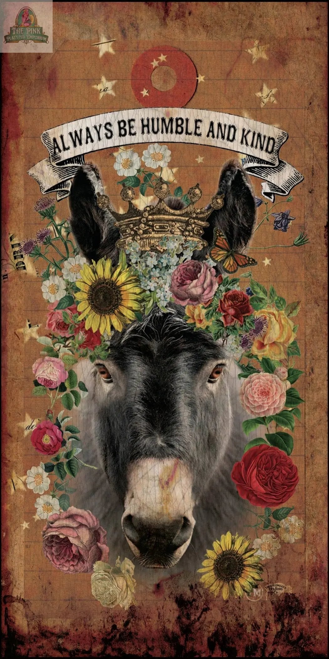 A donkey with a floral crown, colorful flowers, and stars on a rustic background with a banner, “ALWAYS BE HUMBLE AND KIND.” Ideal for a charming large 12" round glass cutting board, charcuterie serving, or trivet.
