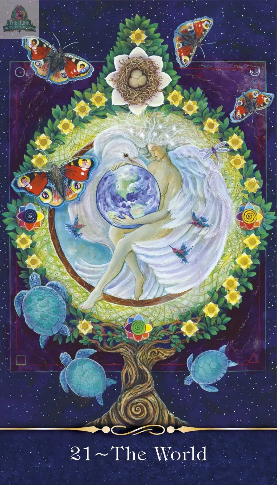 A mystical illustration from The Star Tarot, 2nd Edition by pink platypus emporium shows a winged woman cradling the Earth amid butterflies, bees, flowers, turtles, and a tree under a starry sky. Below is the text “21 ~ The World.