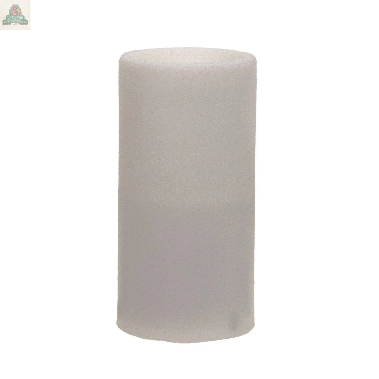 The Pink Platypus Emporium Warm Light White Pillar, 3x6, is a classic cylindrical candle that stands upright and adds a cozy glow to any space.