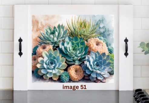 Pink Platypus Emporium succulent stove cover with green, blue and sage botanical design on a solid wood farmhouse noodle board.