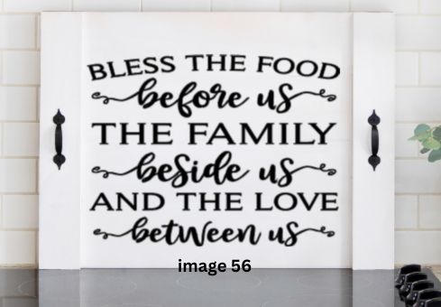 Pink Platypus Emporium family blessing stove cover featuring Bless the Food Before Us, the Family Beside Us and the Love Between Us on a solid wood farmhouse noodle board.