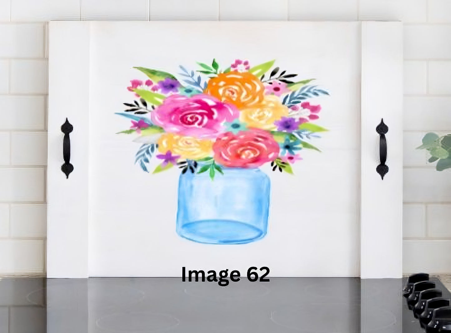 Pink Platypus Emporium colorful floral stove cover with pink, orange and yellow flowers in a blue mason jar on a solid wood farmhouse noodle board.