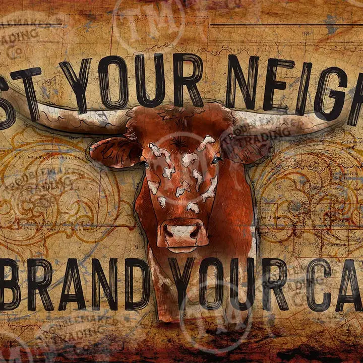western wall decor with a cow illustration and text on a vintage-style background