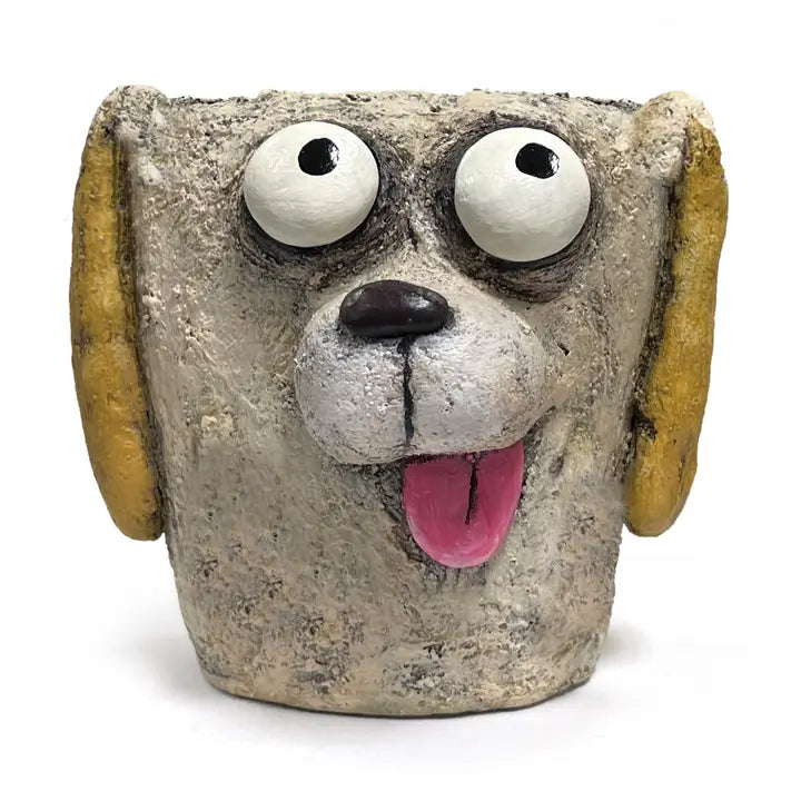 Ceramic dog planter with googly eyes and a pink tongue on a white background