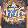 graphic t with '1776' and 'A Rare Bird' text, featuring a clock design.