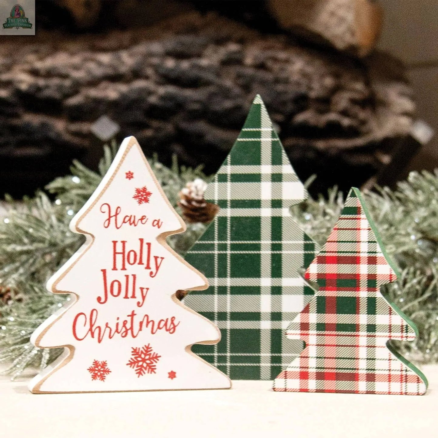 The 3/Set Wooden Holly Jolly Plaid Christmas Trees includes one with “Have a Holly Jolly Christmas” in red and two with green and red plaid, perfect for adding farmhouse charm to your Christmas décor.