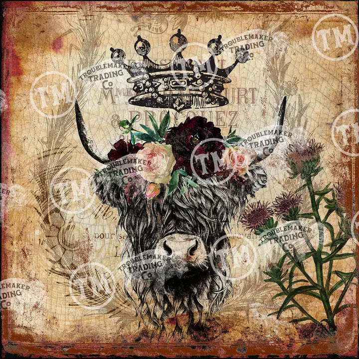 Decorative farmhouse wall decor of a cow with flowers on a vintage-style background with 'Troublemaker Trading Co' branding.