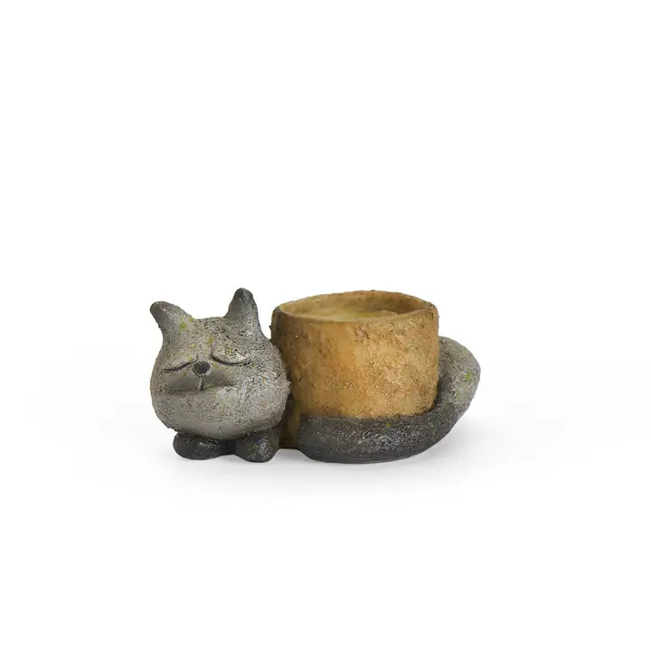 Ceramic cat-shaped planter with a small pot on a white background