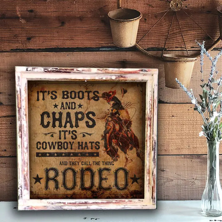 Decorative sign with cowboy-themed text on a wooden wall.