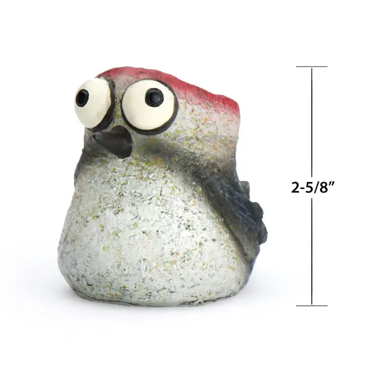 Small bird-shaped figurine with googly eyes and a measurement label on a white background