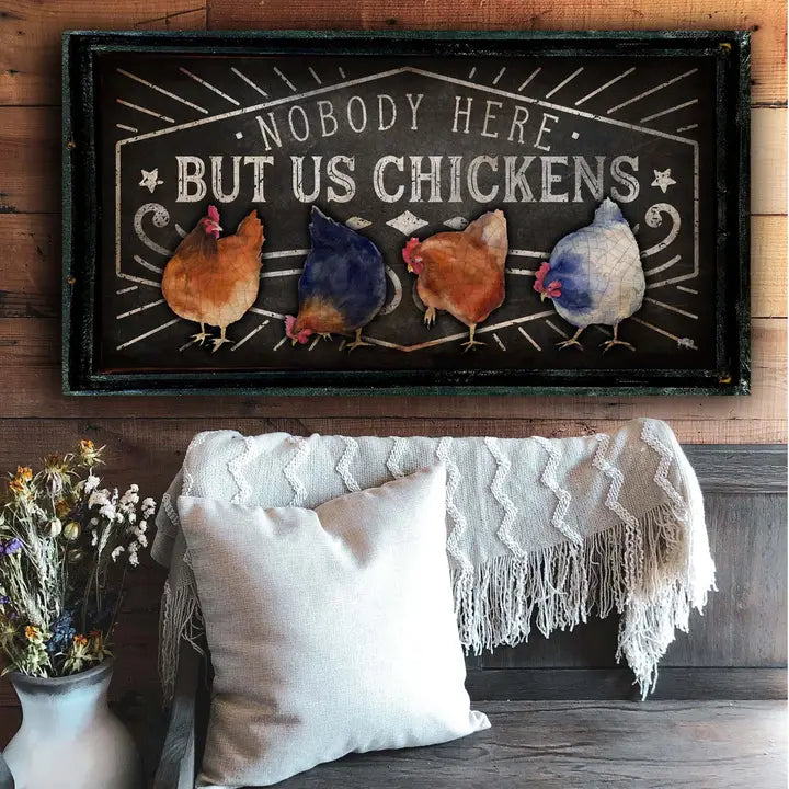 farmhouse wall art with chickens above a cozy living room setting.