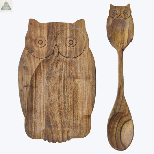 The Young's Acacia Wood Owl Spoon Rest With Spoon features a rustic owl-shaped board and a wooden spoon with an owl-carved handle, both showcasing natural acacia wood grain.