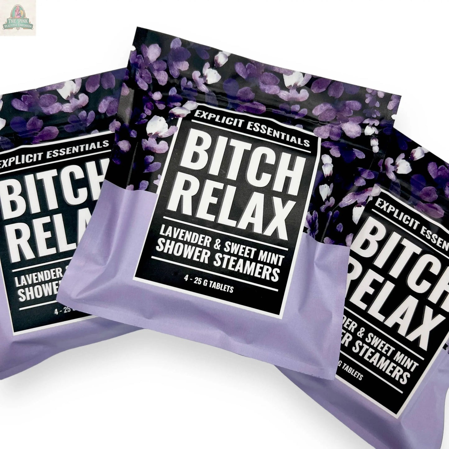 Three packages of Explicit Essentials Bitch Relax Shower Steamers are shown, featuring a purple and black design with lavender accents—ideal for gifting or elevating your own relaxation shower ritual.