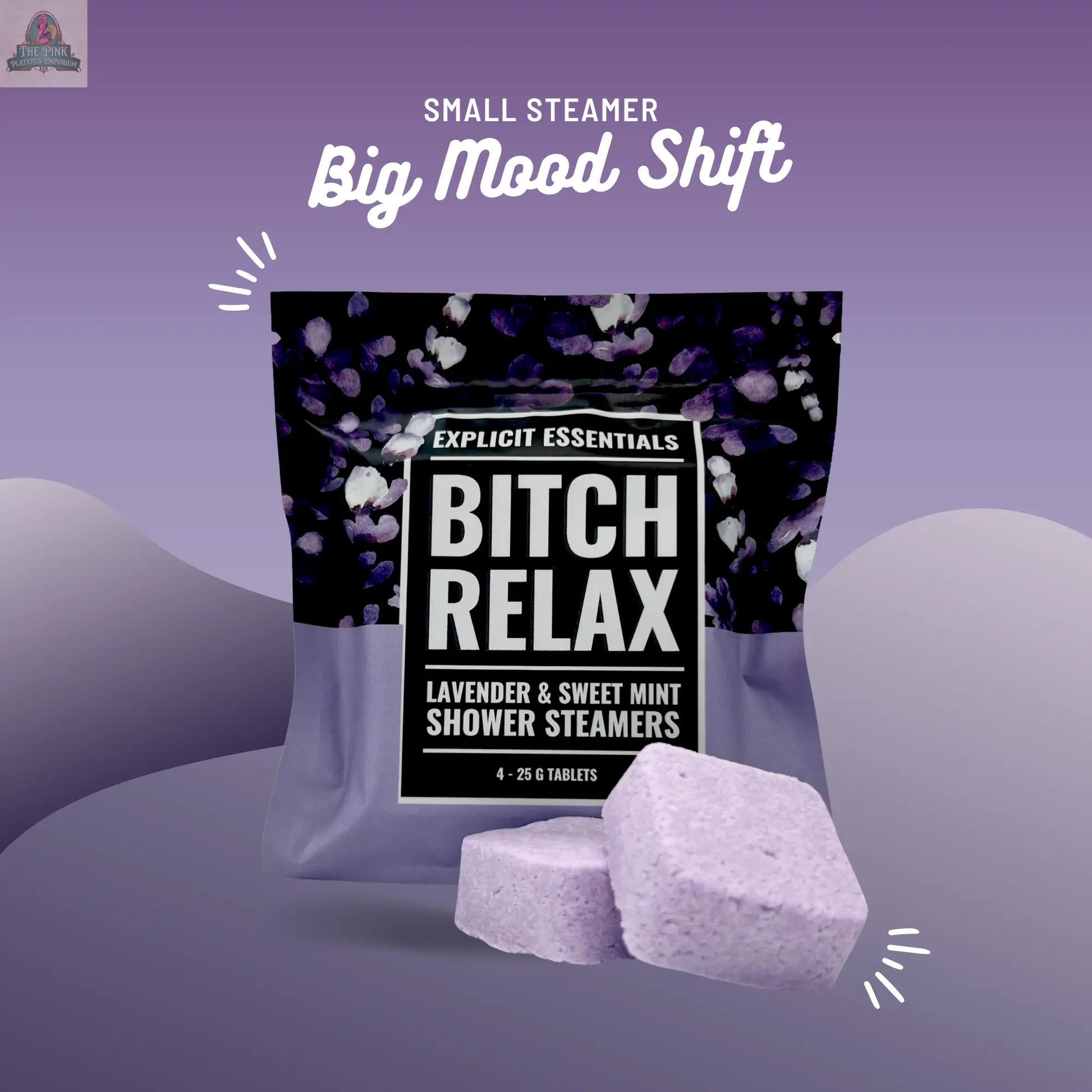 A box of Bitch Relax Shower Steamers by Explicit Essentials sits on a purple background with two steamers in front. Above, the text reads: Small Steamer, Big Mood Shift—ideal for self-care gifts or your relaxation shower routine.