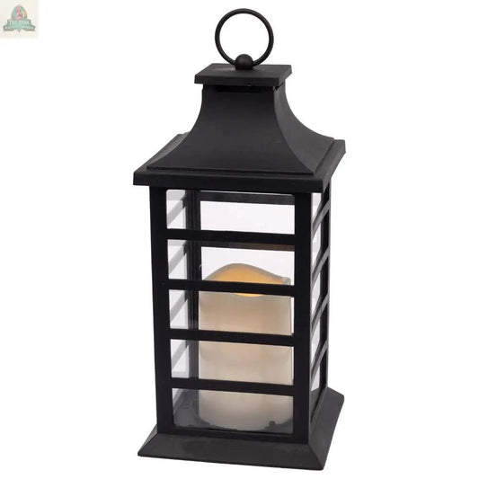The Black Slat Lantern W Led Soy Candle by Boston International offers clear glass panels, a top ring handle, and includes a white LED soy candle for safe, stylish lighting.