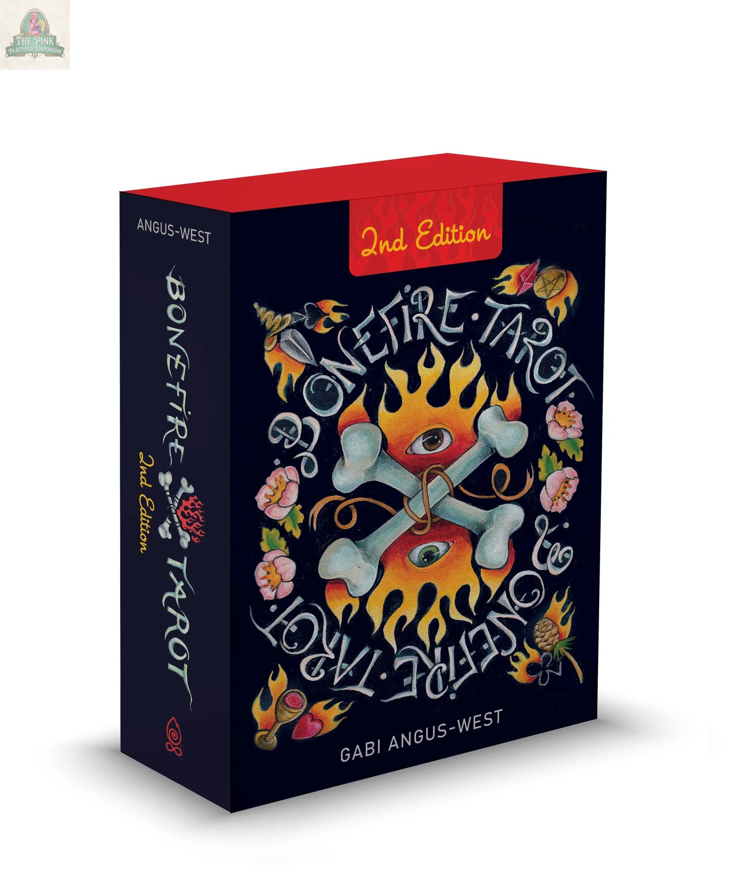 A box of Bonefire Tarot, 2nd Edition by REDFeather showcases hand-painted cards with bold artwork of flames, bones, an eye, and flowers. Artist Gabi Angus-West’s name appears at the bottom.