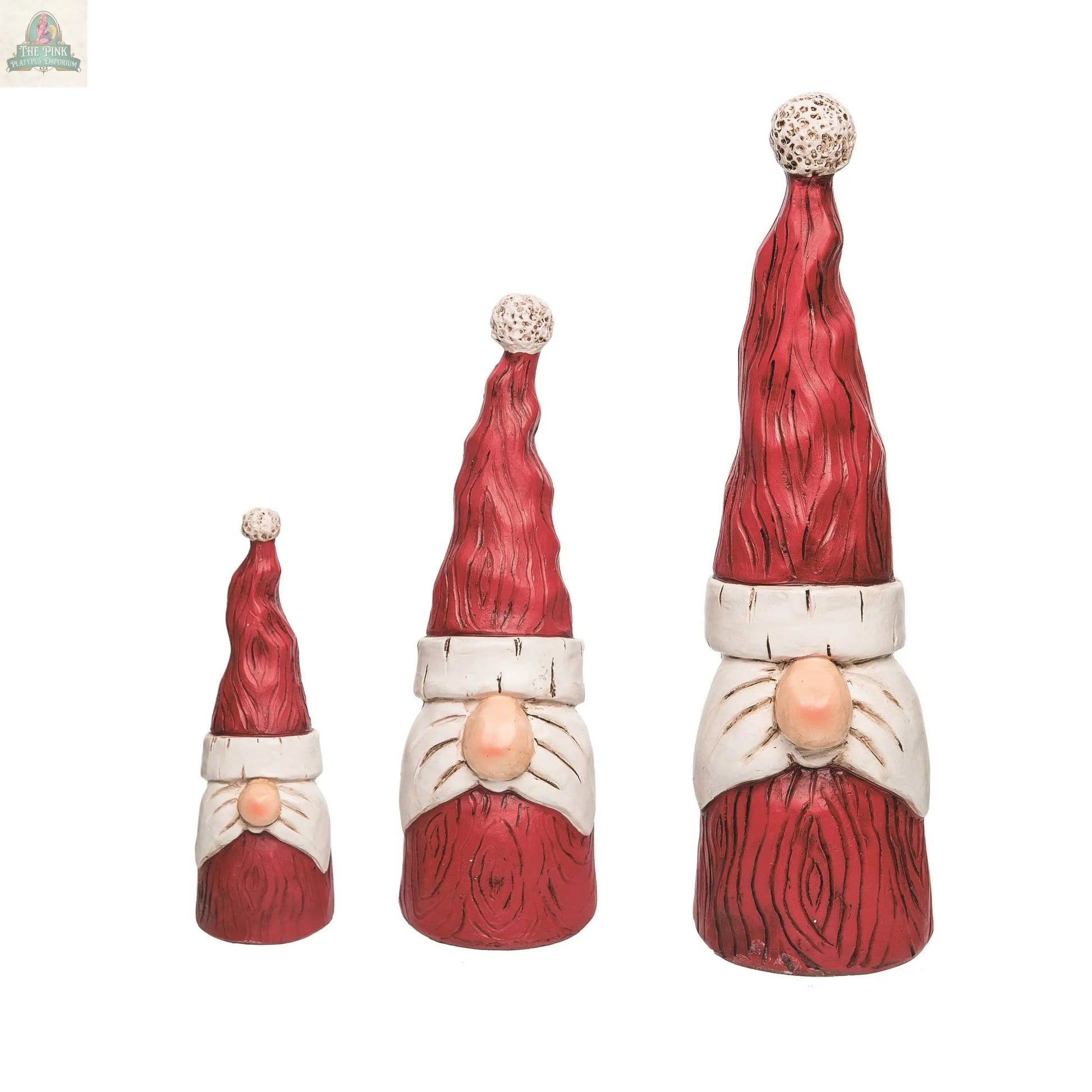 The CLOSEOUT Christmas Resin Gnome Santa Decor Set 3 features red and white gnome figurines with tall hats and round noses, arranged by height—perfect for adding whimsical holiday charm to your home décor.