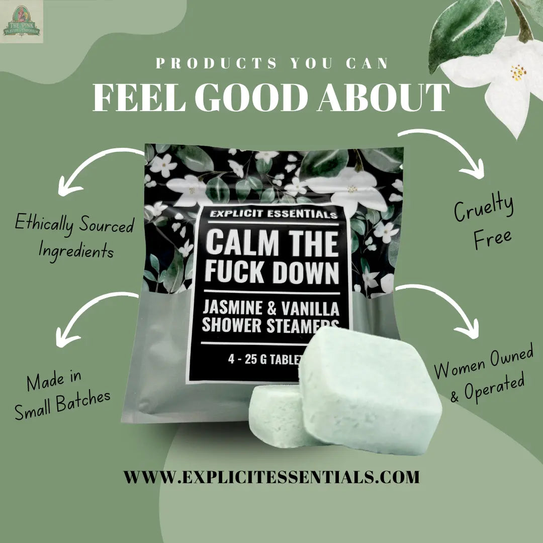 A box of Explicit Essentials Calm TF Down Shower Steamers sits on a green backdrop, with text noting ethical sourcing, cruelty-free, woman-owned business, and small-batch essential oil aromatherapy shower steamers.