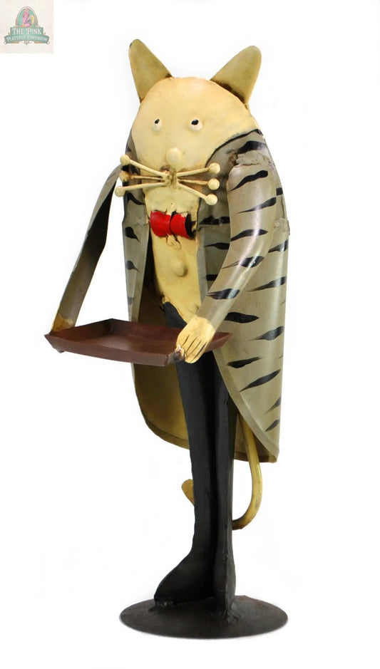The Cat Butler with tray figurine is a 13" vintage décor piece made of iron, featuring a whimsical handmade cat in a striped gray coat, with large ears, a round yellow face, a red bowtie, and holding a decorative tray.