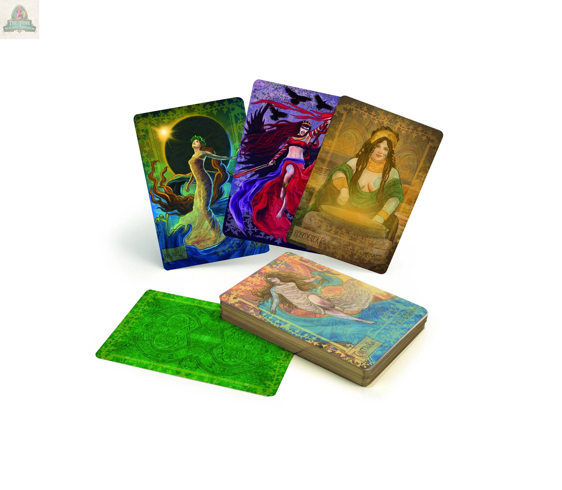 The Celtic Goddesses, Witches, and Queens Oracle by REDFeather is shown on a white surface with illustrated female figures, mystical Celtic themes, green card backs, a stack of cards face down, and four face-up cards displayed.