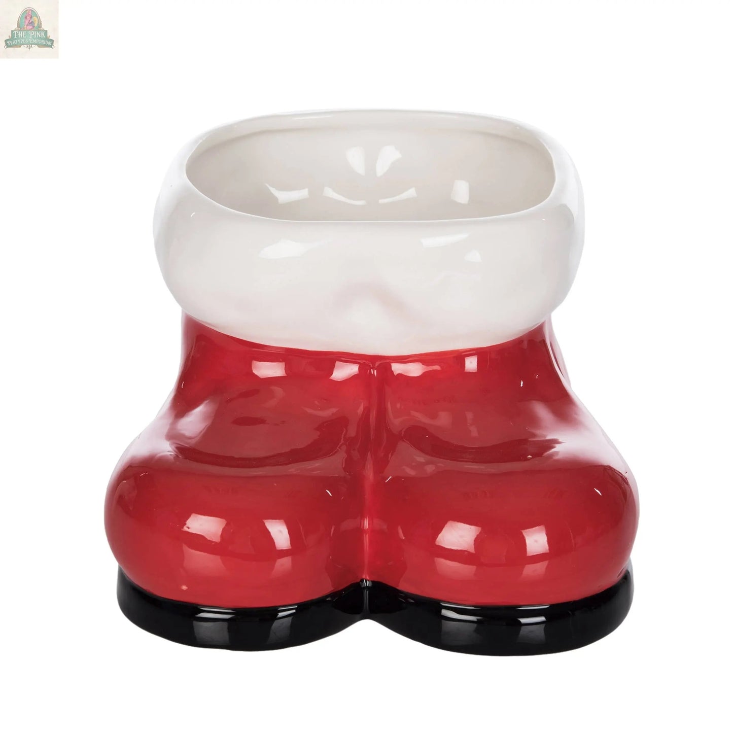 The Ceramic Santa Boots Festive Red Tabletop Decor features empty red ceramic boots with a white rim and black soles, viewed from the front—perfect for holiday decor.