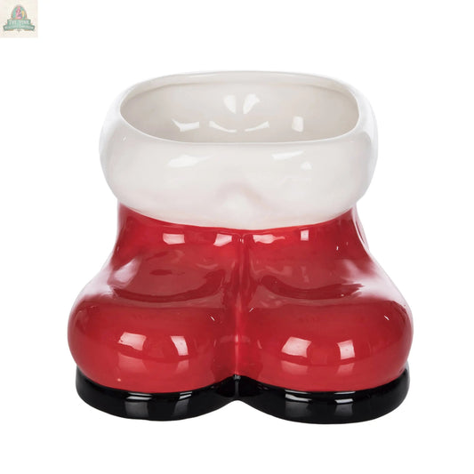 The Ceramic Santa Boots Festive Red Tabletop Decor features empty red ceramic boots with a white rim and black soles, viewed from the front—perfect for holiday decor.
