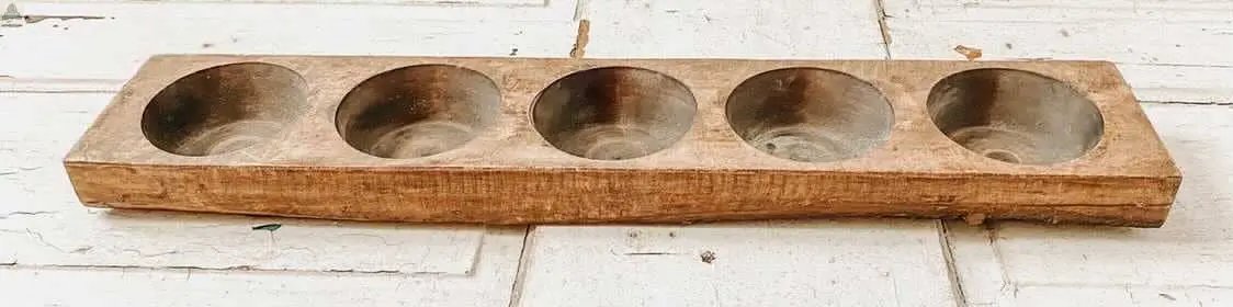 The Cheese Mold - 5 Hole, Farmhouse Decor #B - 6.5 is a real wood rectangular tray with five round, shallow metal bowls in a row, inspired by traditional handmade cheesemolds—perfect for unique home décor.