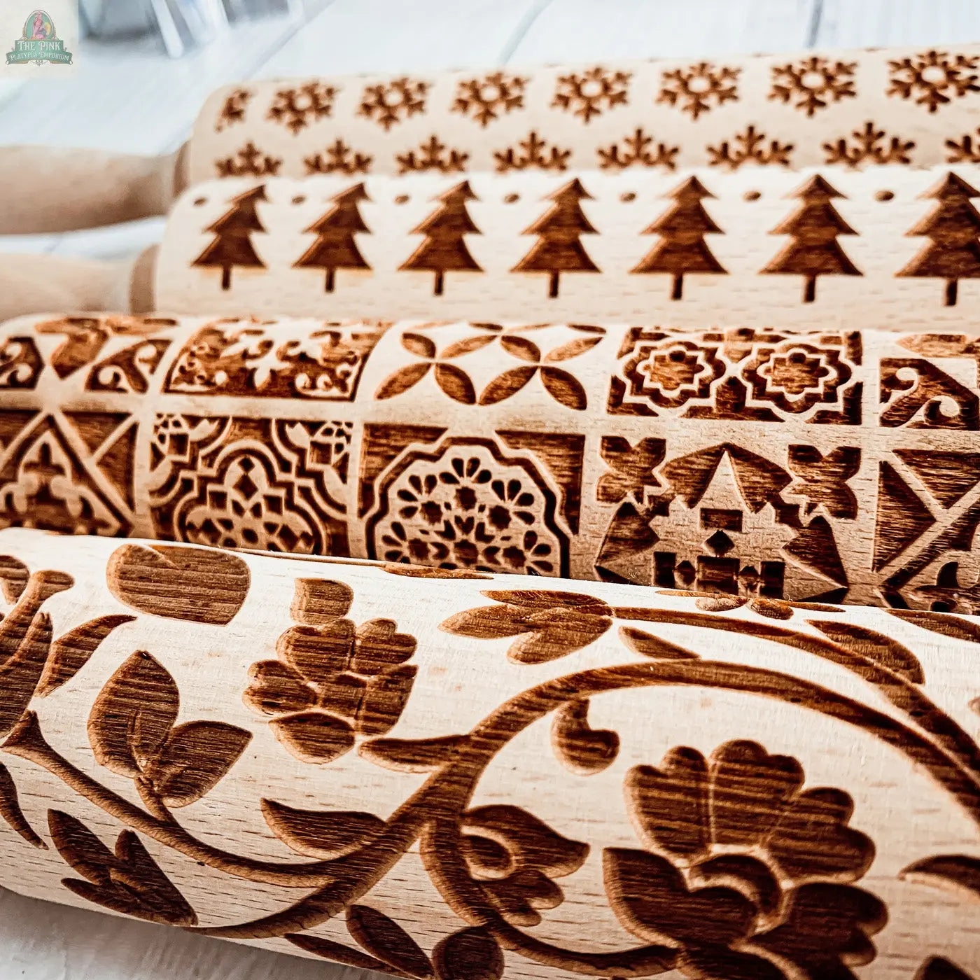 The Christmas Rolling Pin Set | 10 Styles features intricately engraved wooden pins with festive patterns, making a perfect holiday baking gift and a beautiful addition to any kitchen.
