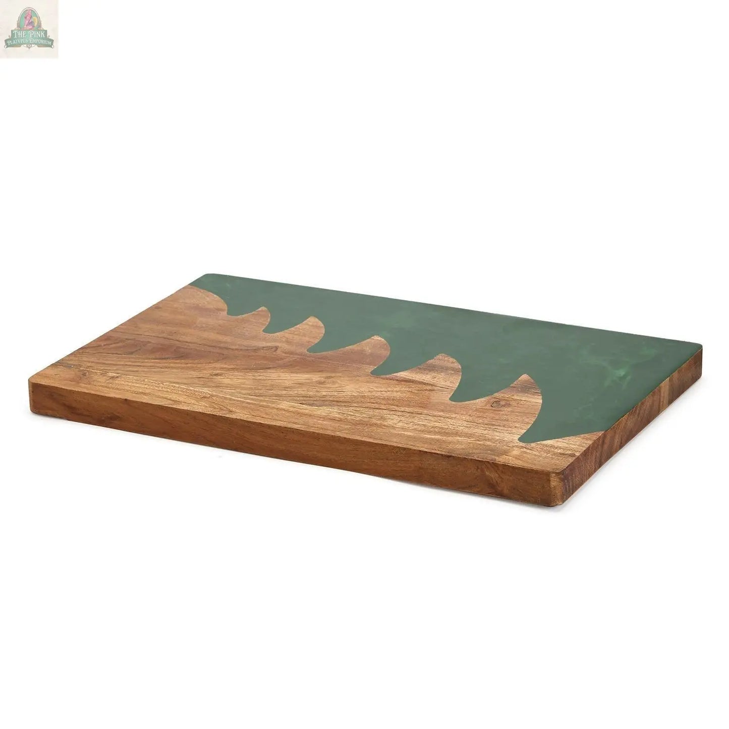 The Christmas Serving Board is a hand-crafted rectangular wooden charcuterie board featuring a wavy green resin inlay on one side, shown lying flat on a white background.