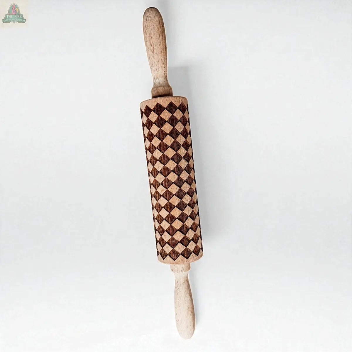 The Courtly Check Rolling Pin features handles at both ends and a distinctive dark and light brown checkered pattern—an elegant addition to your baking tools, shown against a plain white background.