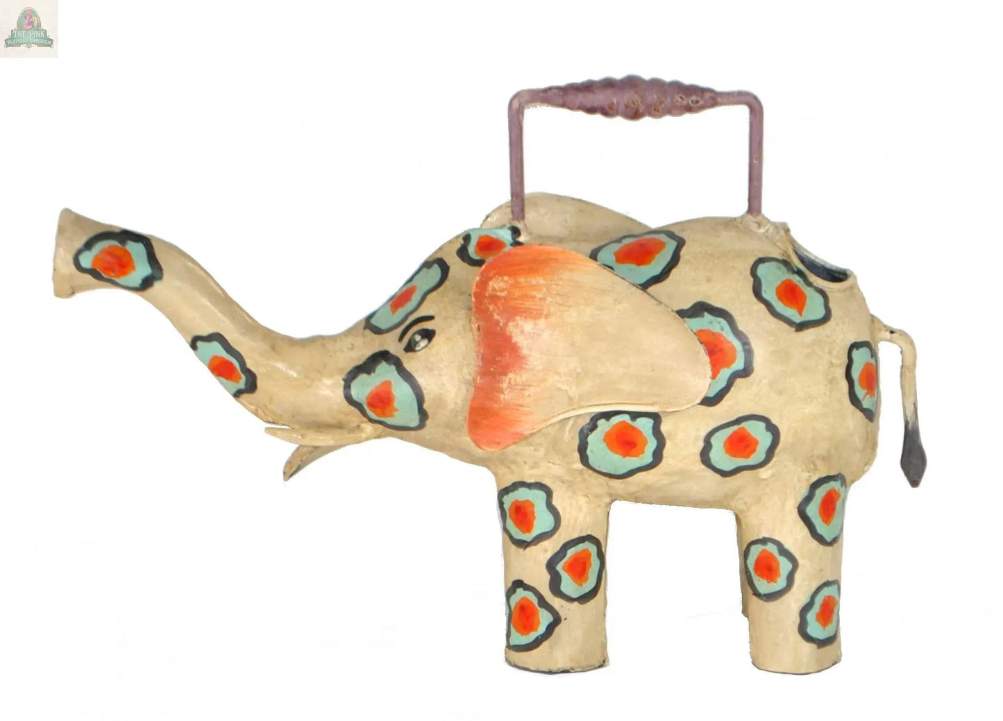 The Elephant Watering Can is a 14" handmade metal can, painted in a rustic style. Shaped like a teapot, it features orange ears, a curved trunk spout, and a purple handle—perfect as a charming decorative garden piece.