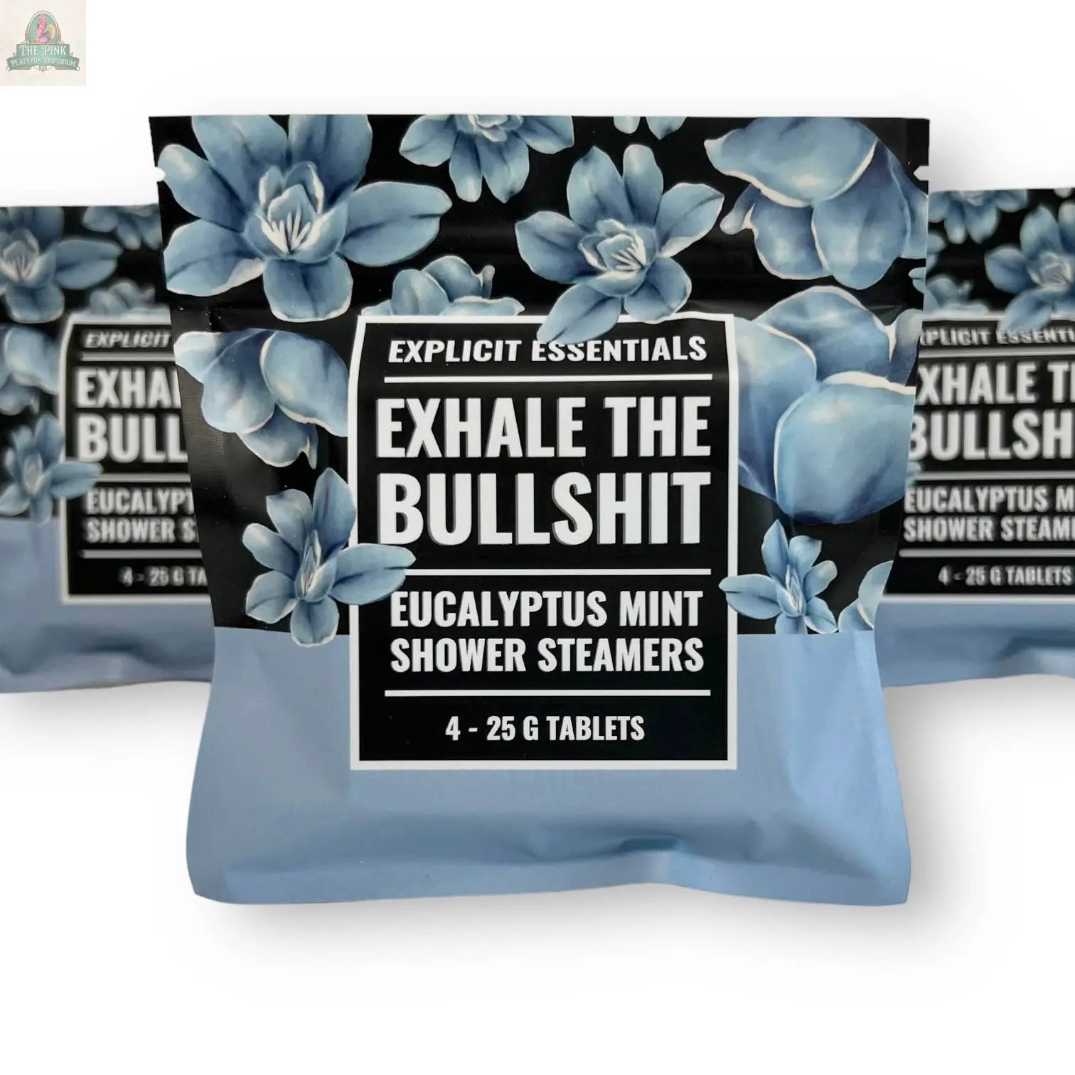 A 4-pack of all natural Exhale The Bullsh!t Shower Steamers by Explicit Essentials, featuring a refreshing eucalyptus mint scent and blue flowers on a black background.