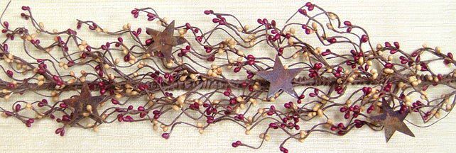 Decorative berry garland with stars on a white background