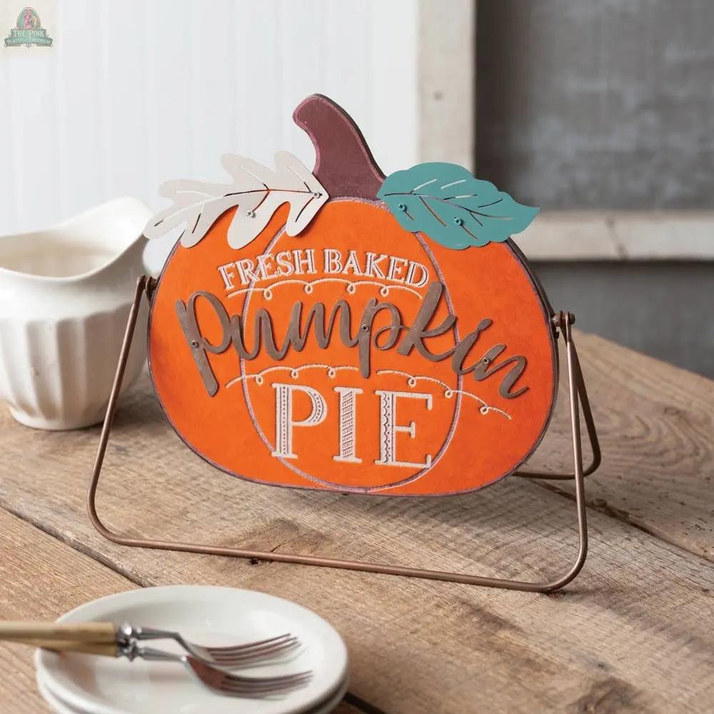 The Fresh Baked Pumpkin Pie A-Frame Tabletop Sign brings a charming, festive touch to your Thanksgiving table.