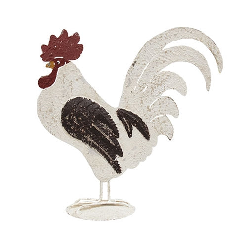 Decorative metal rooster figure on a white background
