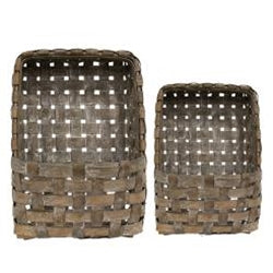 Two woven baskets of different sizes on a white background