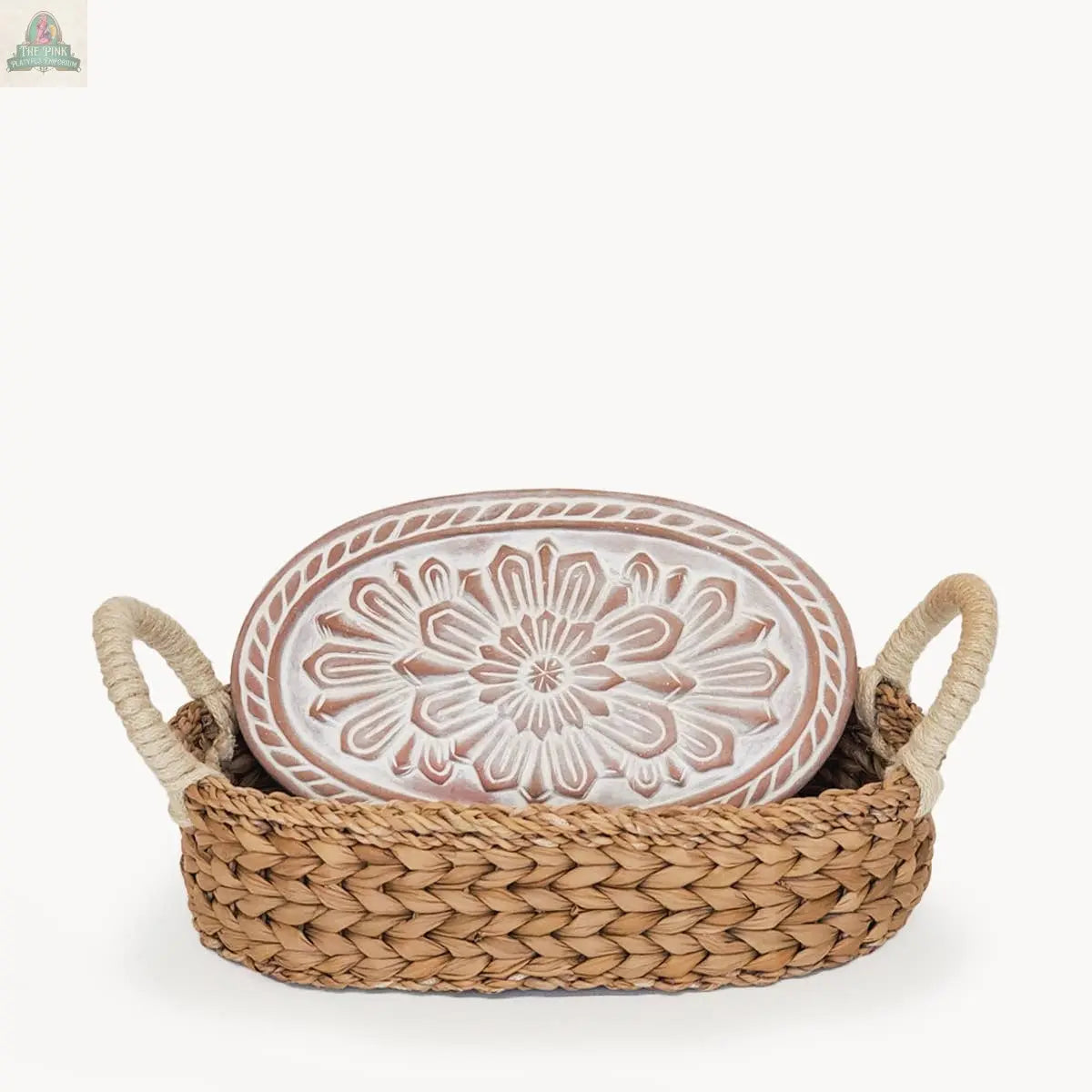 The KORISSA Handmade Bread Warmer & Wicker Basket - Flower includes a terracotta stone in a wicker basket, ideal for keeping your bread warm and fresh.