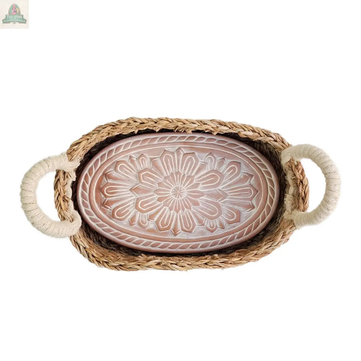 KORISSA’s Handmade Bread Warmer & Wicker Basket - Flower features an oval wicker basket with rope handles and a decorative floral-embossed ceramic bread warmer, all beautifully displayed from above on a white background.