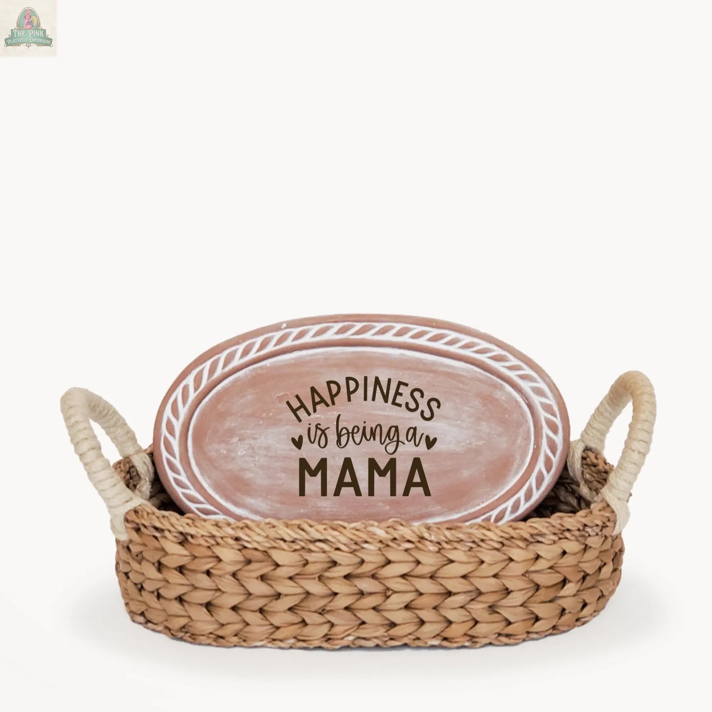 The Handmade Bread Warmer & Wicker Basket - Mom Oval : Design 3 features an oval plate with "Happiness is being a Mama" nestled in a wicker basket with handles, displayed against a plain white background.