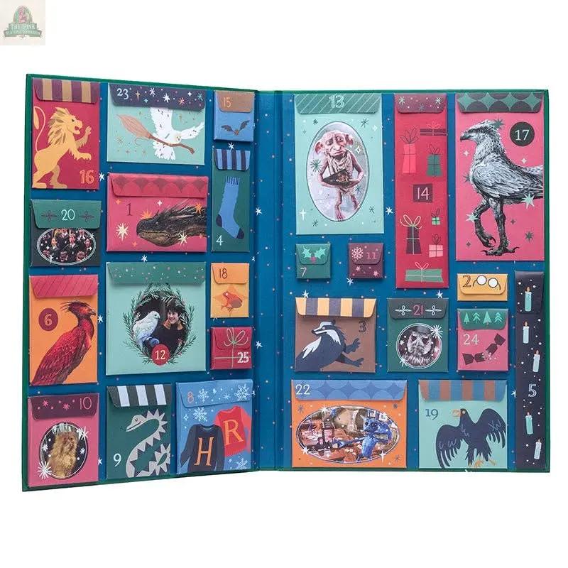 The Harry Potter Holiday Magic: Official Advent Calendar features 24 numbered, colorful doors on two grid panels with illustrations of animals, magical creatures, and festive designs—perfect for bringing holiday magic to your season.