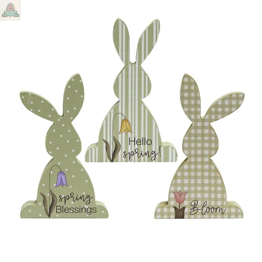 The Hello Spring Chunky Bunny, 3 Assorted, features decorative wooden bunny sitters with pastel spring patterns and messages: Spring Blessings, Hello Spring, and Bloom—perfect for charming seasonal décor.
